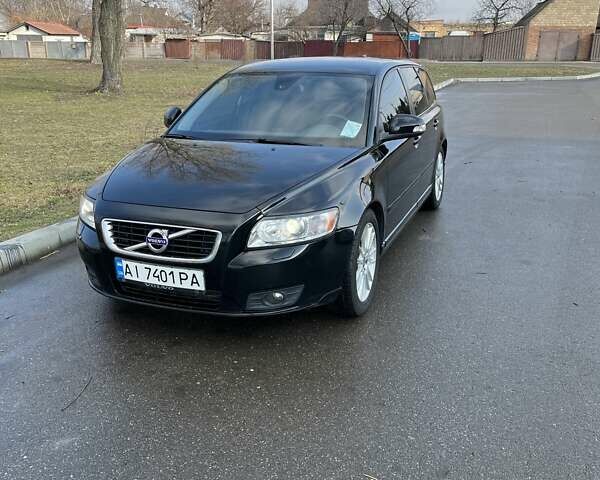 Черный Вольво В50, объемом двигателя 1.6 л и пробегом 267 тыс. км за 7800 $, фото 1 на Automoto.ua
