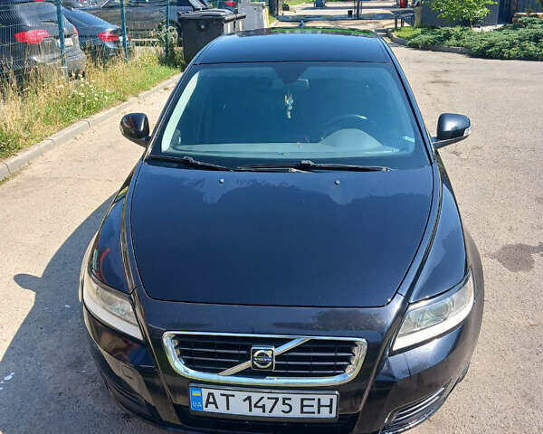Черный Вольво В50, объемом двигателя 1.56 л и пробегом 230 тыс. км за 6200 $, фото 1 на Automoto.ua