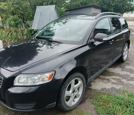 Черный Вольво В50, объемом двигателя 1.56 л и пробегом 283 тыс. км за 6700 $, фото 1 на Automoto.ua