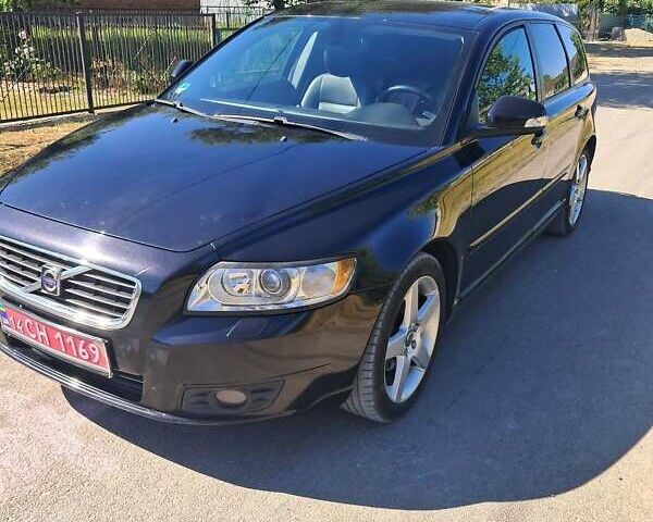 Черный Вольво В50, объемом двигателя 1.6 л и пробегом 261 тыс. км за 7000 $, фото 1 на Automoto.ua