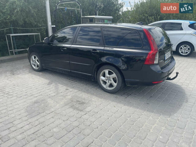 Черный Вольво В50, объемом двигателя 1.6 л и пробегом 234 тыс. км за 7699 $, фото 1 на Automoto.ua