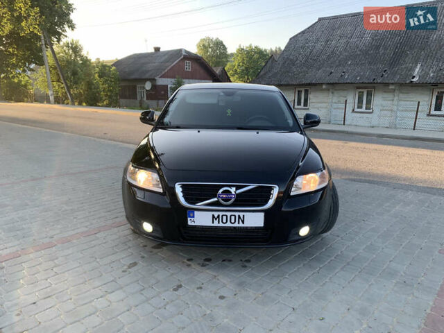 Черный Вольво В50, объемом двигателя 1.6 л и пробегом 234 тыс. км за 7850 $, фото 1 на Automoto.ua