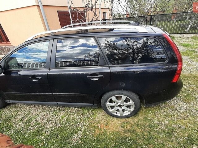 Чорний Вольво V50, об'ємом двигуна 1.56 л та пробігом 298 тис. км за 7399 $, фото 1 на Automoto.ua