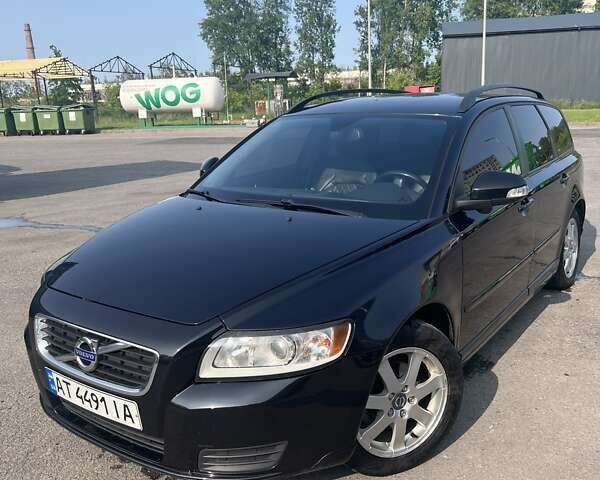 Черный Вольво В50, объемом двигателя 1.6 л и пробегом 213 тыс. км за 7900 $, фото 1 на Automoto.ua