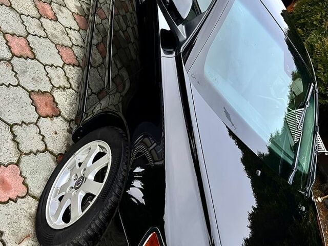 Черный Вольво В50, объемом двигателя 1.6 л и пробегом 210 тыс. км за 7300 $, фото 1 на Automoto.ua