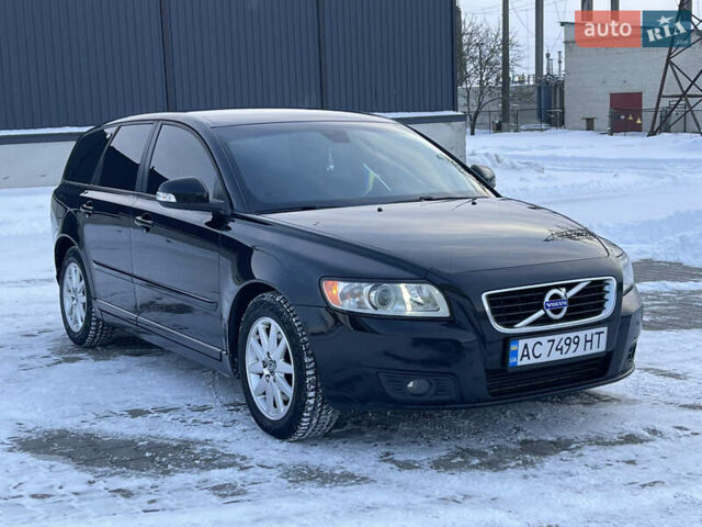 Черный Вольво В50, объемом двигателя 2 л и пробегом 280 тыс. км за 8599 $, фото 1 на Automoto.ua