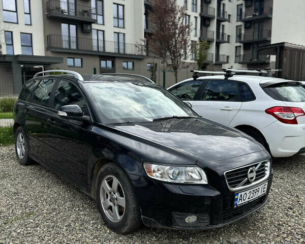 Чорний Вольво V50, об'ємом двигуна 1.56 л та пробігом 185 тис. км за 7300 $, фото 1 на Automoto.ua