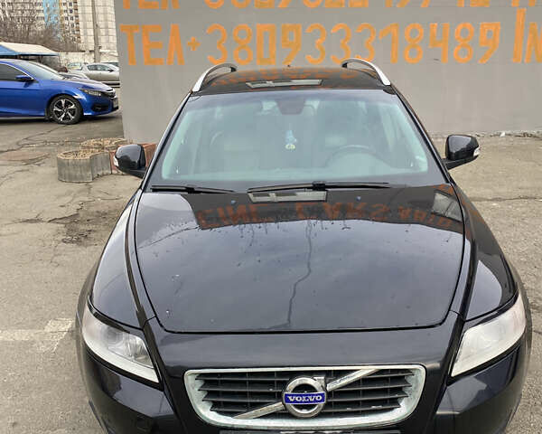 Черный Вольво В50, объемом двигателя 1.56 л и пробегом 243 тыс. км за 8500 $, фото 1 на Automoto.ua