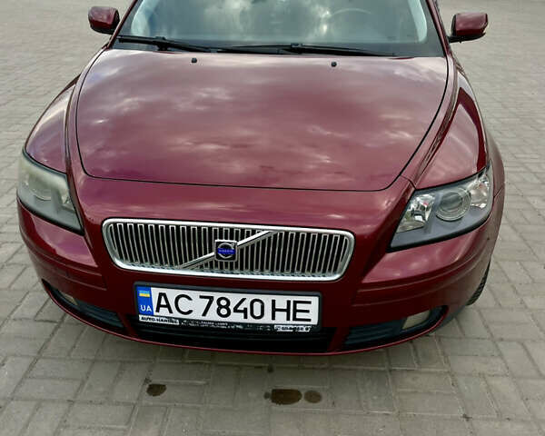 Красный Вольво В50, объемом двигателя 2 л и пробегом 309 тыс. км за 5500 $, фото 1 на Automoto.ua