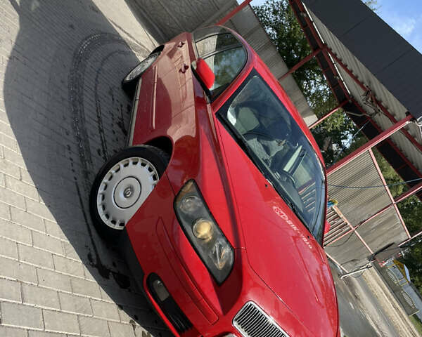 Красный Вольво В50, объемом двигателя 2 л и пробегом 298 тыс. км за 5000 $, фото 1 на Automoto.ua