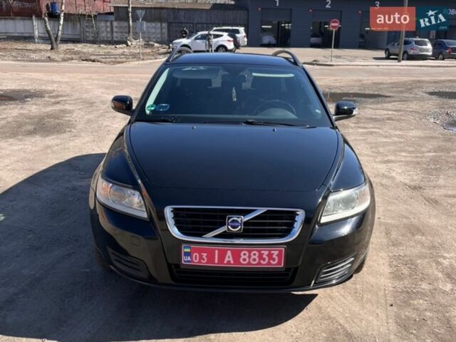 Червоний Вольво V50, об'ємом двигуна 1.6 л та пробігом 219 тис. км за 6700 $, фото 1 на Automoto.ua