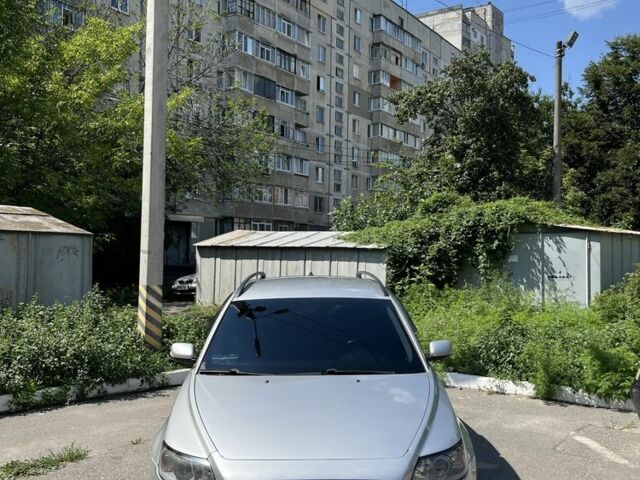 Серый Вольво В50, объемом двигателя 1.6 л и пробегом 292 тыс. км за 5702 $, фото 1 на Automoto.ua