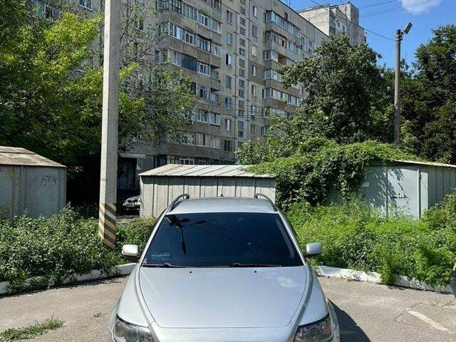 Сірий Вольво V50, об'ємом двигуна 1.56 л та пробігом 292 тис. км за 6200 $, фото 1 на Automoto.ua
