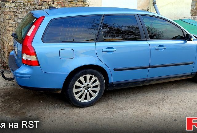 Синій Вольво V50, об'ємом двигуна 2 л та пробігом 450 тис. км за 5100 $, фото 1 на Automoto.ua