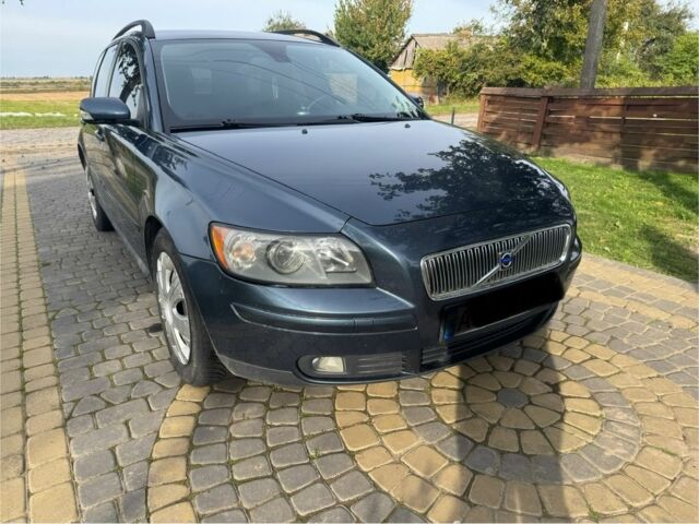 Синий Вольво В50, объемом двигателя 2 л и пробегом 285 тыс. км за 5300 $, фото 1 на Automoto.ua