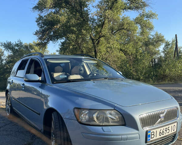 Синий Вольво В50, объемом двигателя 1.8 л и пробегом 305 тыс. км за 7000 $, фото 1 на Automoto.ua