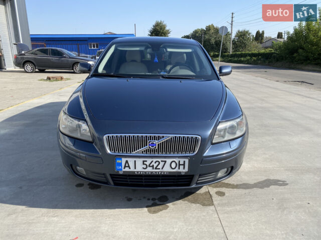 Синій Вольво V50, об'ємом двигуна 2.4 л та пробігом 320 тис. км за 5899 $, фото 1 на Automoto.ua