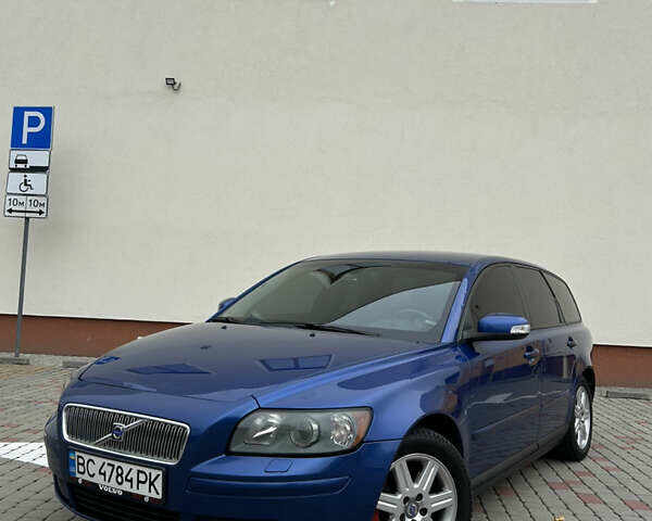 Синій Вольво V50, об'ємом двигуна 2 л та пробігом 344 тис. км за 7499 $, фото 1 на Automoto.ua