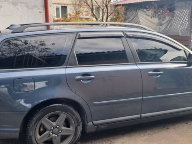 Синий Вольво В50, объемом двигателя 2 л и пробегом 260 тыс. км за 7030 $, фото 1 на Automoto.ua