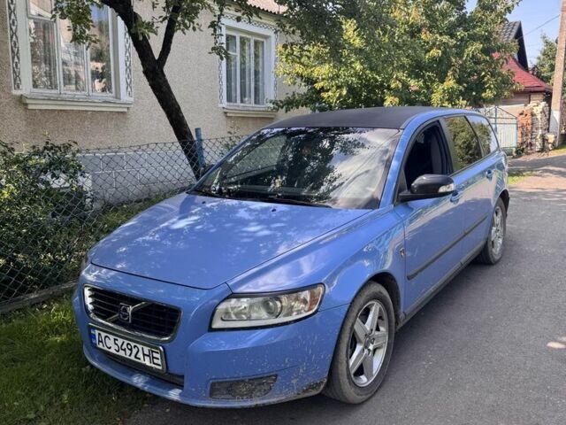 Синій Вольво V50, об'ємом двигуна 2 л та пробігом 270 тис. км за 4700 $, фото 1 на Automoto.ua