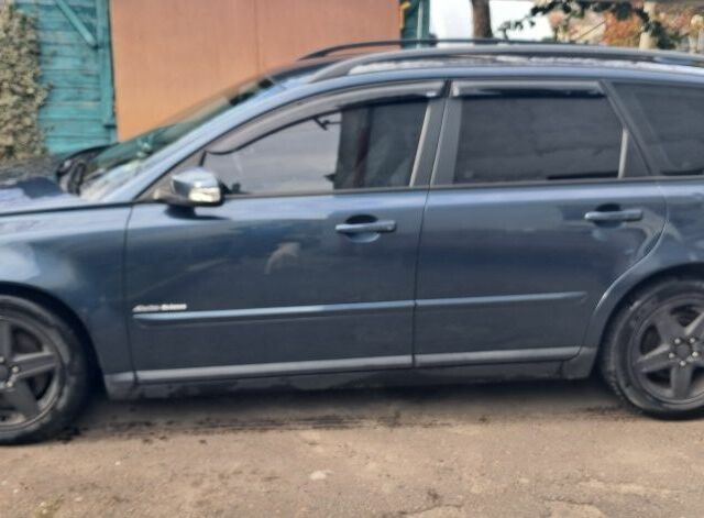 Синій Вольво V50, об'ємом двигуна 2 л та пробігом 260 тис. км за 7041 $, фото 1 на Automoto.ua