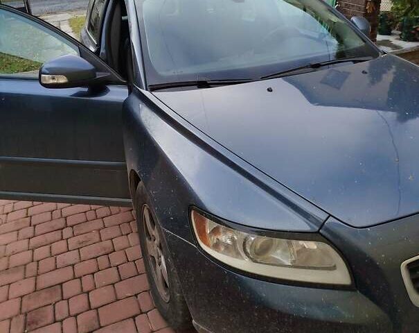 Синий Вольво В50, объемом двигателя 1.6 л и пробегом 270 тыс. км за 7849 $, фото 1 на Automoto.ua