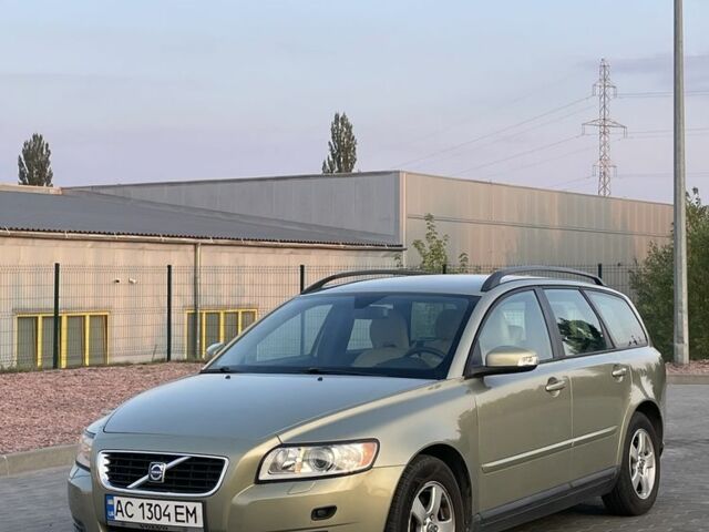Зеленый Вольво В50, объемом двигателя 1.8 л и пробегом 256 тыс. км за 6293 $, фото 1 на Automoto.ua
