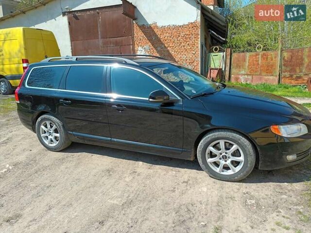 Черный Вольво В70, объемом двигателя 2.4 л и пробегом 305 тыс. км за 12000 $, фото 1 на Automoto.ua