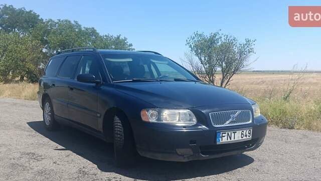Синий Вольво В70, объемом двигателя 2.4 л и пробегом 450 тыс. км за 1450 $, фото 1 на Automoto.ua