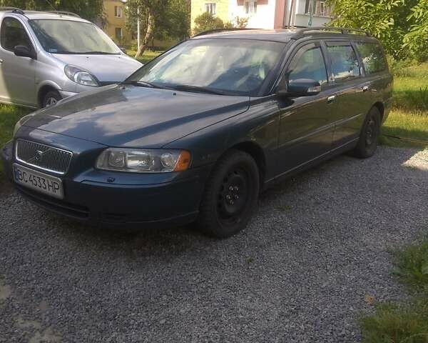 Синий Вольво В70, объемом двигателя 2.4 л и пробегом 240 тыс. км за 6000 $, фото 1 на Automoto.ua