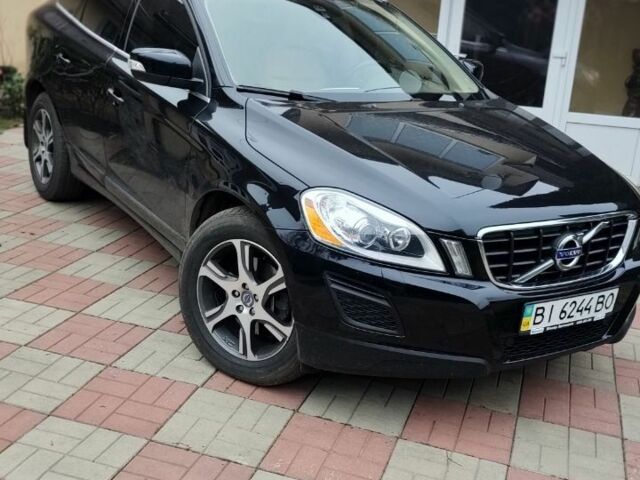 Черный Вольво ХС60, объемом двигателя 2.4 л и пробегом 102 тыс. км за 20000 $, фото 1 на Automoto.ua