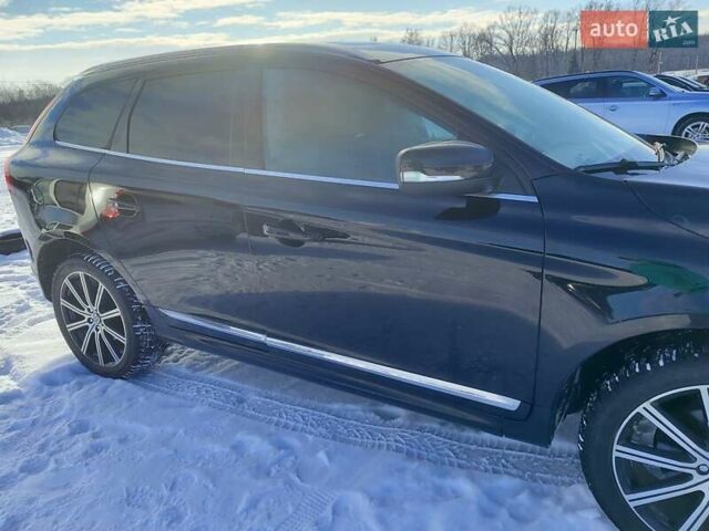 Чорний Вольво ХС60, об'ємом двигуна 1.97 л та пробігом 128 тис. км за 15950 $, фото 1 на Automoto.ua