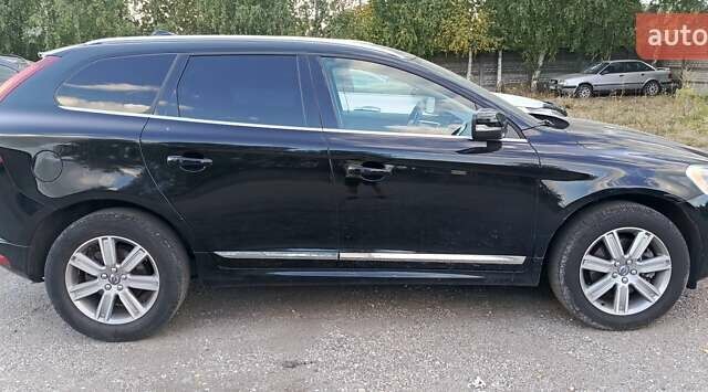 Черный Вольво ХС60, объемом двигателя 2.5 л и пробегом 82 тыс. км за 25500 $, фото 1 на Automoto.ua