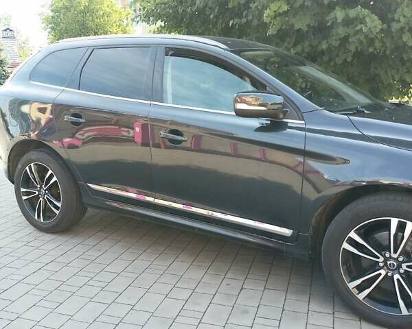 Черный Вольво ХС60, объемом двигателя 2 л и пробегом 260 тыс. км за 10999 $, фото 1 на Automoto.ua