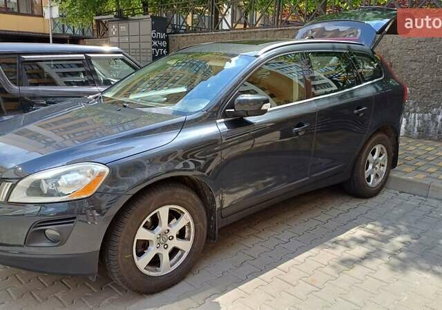 Сірий Вольво ХС60, об'ємом двигуна 2.4 л та пробігом 320 тис. км за 11300 $, фото 1 на Automoto.ua