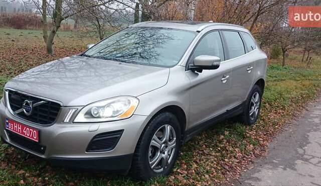 Серый Вольво ХС60, объемом двигателя 2.4 л и пробегом 285 тыс. км за 15300 $, фото 1 на Automoto.ua
