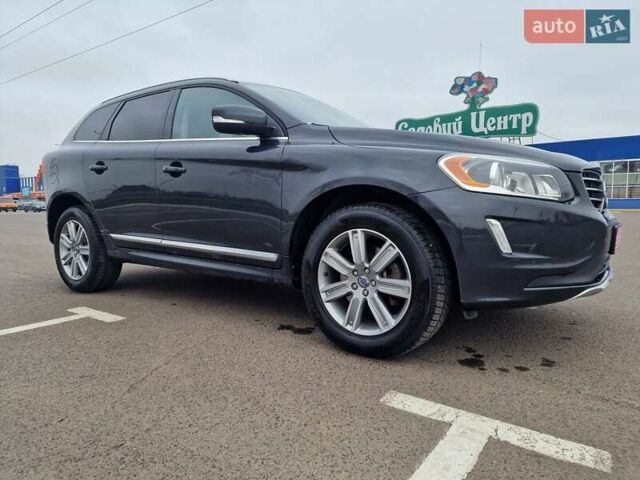 Серый Вольво ХС60, объемом двигателя 2.5 л и пробегом 210 тыс. км за 15900 $, фото 1 на Automoto.ua