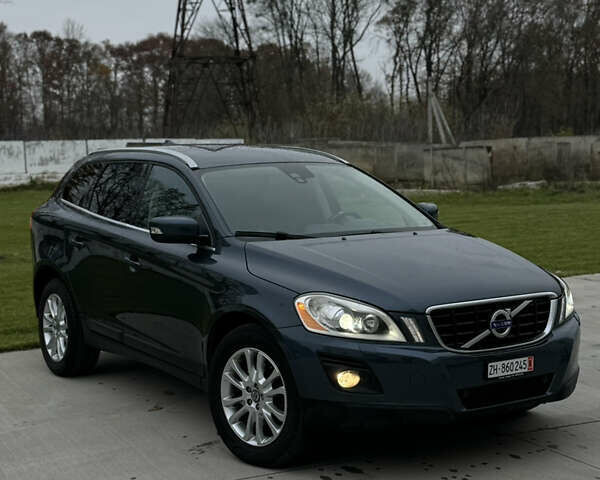 Синий Вольво ХС60, объемом двигателя 2.4 л и пробегом 240 тыс. км за 12800 $, фото 1 на Automoto.ua