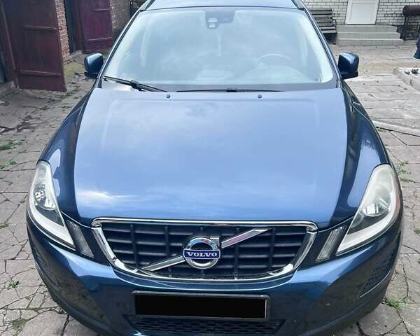 Синий Вольво ХС60, объемом двигателя 2.4 л и пробегом 330 тыс. км за 13500 $, фото 1 на Automoto.ua