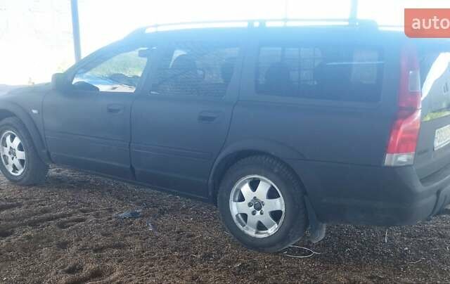 Черный Вольво ХС70, объемом двигателя 2.5 л и пробегом 210 тыс. км за 3000 $, фото 1 на Automoto.ua