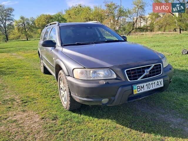 Серый Вольво ХС70, объемом двигателя 2.5 л и пробегом 371 тыс. км за 6400 $, фото 1 на Automoto.ua