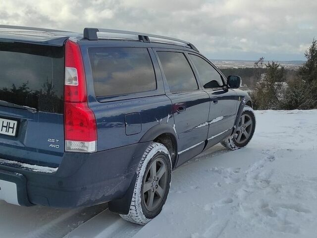 Синий Вольво ХС70, объемом двигателя 2.52 л и пробегом 285 тыс. км за 6900 $, фото 1 на Automoto.ua