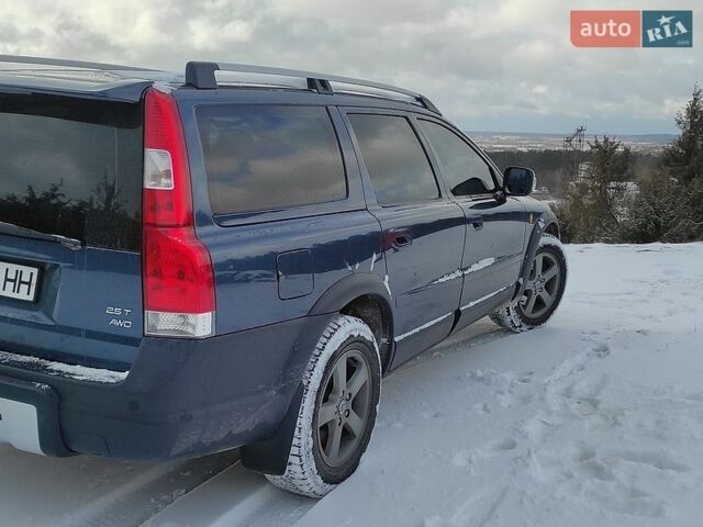 Синий Вольво ХС70, объемом двигателя 2.52 л и пробегом 283 тыс. км за 7300 $, фото 1 на Automoto.ua