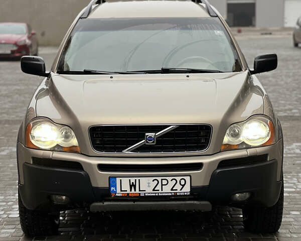 Бежевый Вольво ХС90, объемом двигателя 2.4 л и пробегом 377 тыс. км за 4900 $, фото 1 на Automoto.ua