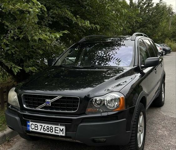 Черный Вольво ХС90, объемом двигателя 2.5 л и пробегом 330 тыс. км за 7500 $, фото 1 на Automoto.ua