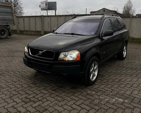 Черный Вольво ХС90, объемом двигателя 2.4 л и пробегом 282 тыс. км за 5600 $, фото 1 на Automoto.ua
