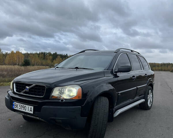 Черный Вольво ХС90, объемом двигателя 2.4 л и пробегом 187 тыс. км за 8500 $, фото 1 на Automoto.ua