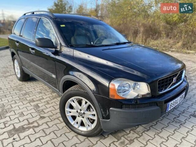 Черный Вольво ХС90, объемом двигателя 2.4 л и пробегом 322 тыс. км за 5550 $, фото 1 на Automoto.ua