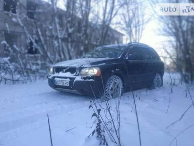 Черный Вольво ХС90, объемом двигателя 2.5 л и пробегом 207 тыс. км за 7500 $, фото 1 на Automoto.ua