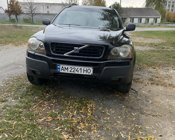Черный Вольво ХС90, объемом двигателя 2.4 л и пробегом 306 тыс. км за 10500 $, фото 1 на Automoto.ua